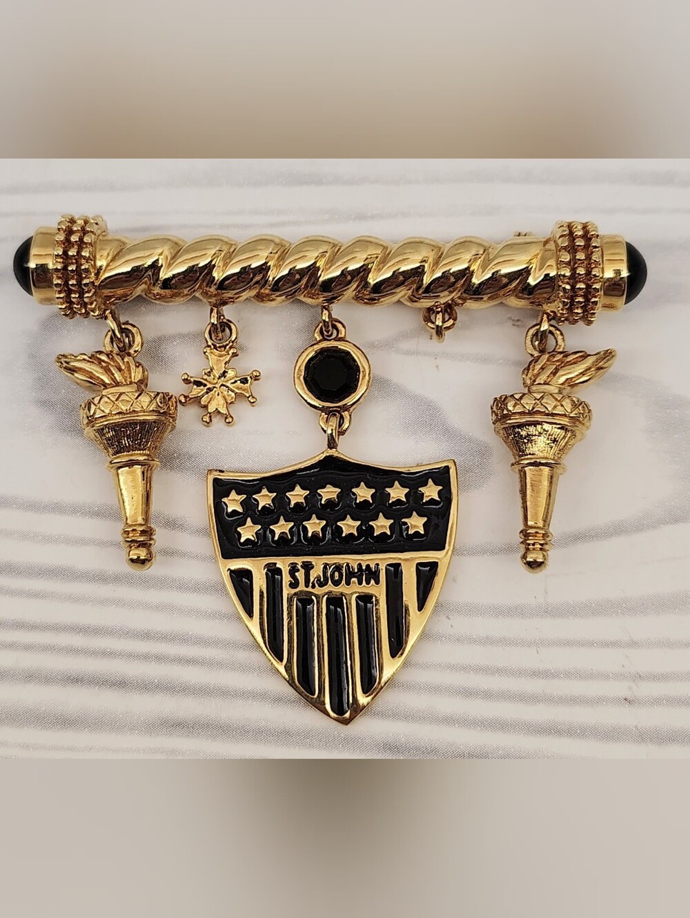 St. John Gold-Tone Shield and Torch Brooch w/Black Enamel